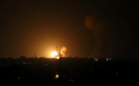 An explosion is seen following an Israeli air strike in the southern Gaza Strip, July 20, 2018. PHOTO BY REUTERS/Ibraheem Abu Mustafa
