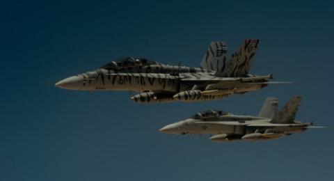 Two U.S. Marine Corps F-18 Super Hornets depart after receiving fuel from a 908th Expeditionary Air Refueling Squadron KC-10 Extender during a flight in support of Operation Inherent Resolve, May 31, 2017. PHOTO BY REUTERS/U.S. Air Force/Staff Sgt. Michael Battles