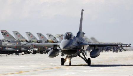 A Turkish Air Force F16 jet fighter prepares to take off from an air base during the Anatolian Eagle military exercise in the central Anatolian city of Konya, April 28, 2010. PHOTO BY REUTERS/Umit Bektas
