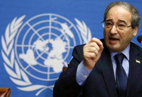 Syrian Deputy Foreign Minister Faisal Meqdad addresses the media after a meeting at the Geneva Conference on Syria at the United Nations European headquarters in Geneva, February 14, 2014. PHOTO BY REUTERS/Denis Balibouse