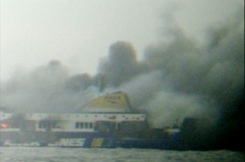 The car ferry Norman Atlantic burns in waters off Greece in this still image from video, December 28, 2014. PHOTO BY REUTERS/Skai TV via Reuters TV
