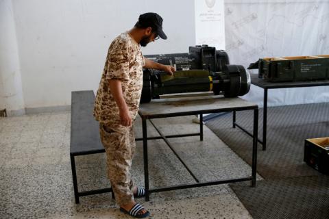 A member of forces allied to Libya's internationally recognized government looks at American Javelin anti-tank missiles, which were confiscated from eastern forces led by Khalifa Haftar in Gharyan, in Tripoli, Libya, June 29, 2019. PHOTO BY REUTERS/Ismail Zitouny