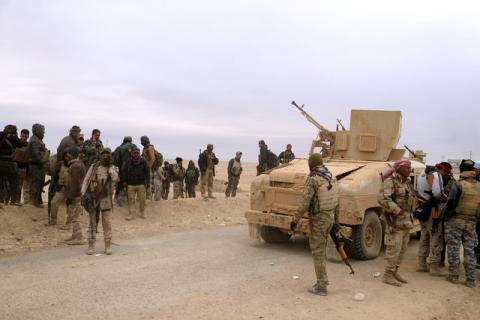 Members of the Lions of the Tigris, a group of Sunni Arab fighters and part of the Hashid Shaabi (Popular Mobilization Comimittee) take part during a military operation against Islamic State militants in Shayyalah al-Imam, Iraq, November 30, 2016. PHOTO BY REUTERS/Thaier Al-Sudani
