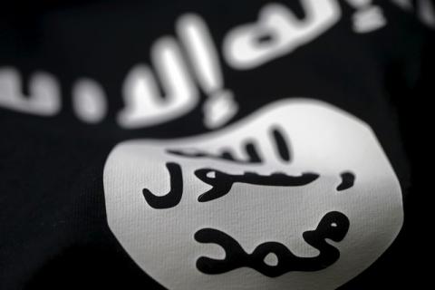 An Islamic State flag is seen in this picture illustration taken February 18, 2016. PHOTO BY REUTERS