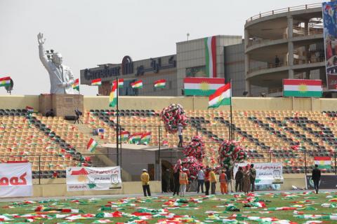 People carry the flags of Kurdistan before the start of a rally calling to vote yes in the coming referendum, in Erbil, Iraq, September 22, 2017. PHOTO BY REUTERS/Azad Lashkari