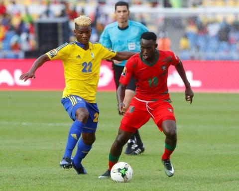 Gabon's Didier Ibrahim Ndong tackles Guinea-Bissau's Joao Mario Nunes Fernandes in the African Cup of Nations in Stade de l'Amitie, Libreville, Gabon, January, 14, 2017. PHOTO BY REUTERS/Mike Hutchings