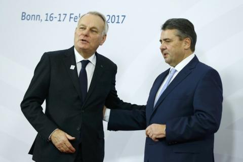 German Foreign Minister Sigmar Gabriel (R) welcomes French Foreign Minister Jean-Marc Ayrault prior to the G-20 Foreign Ministers meeting in Bonn, Germany, February 16, 2017. PHOTO BY REUTERS/Thilo Schmuelgen