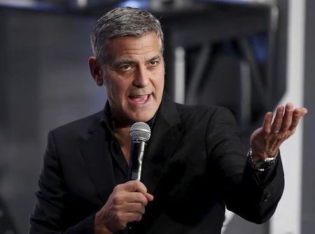 Cast member George Clooney speaks to fans during the Japan premiere of the movie "Tomorrowland" in Tokyo, May 25, 2015. PHOTO BY REUTERS/Toru Hanai