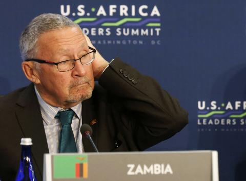 Zambia's Guy Scott (L) listens as U.S. President Barack Obama (not pictured) speaks, at the first Leaders' Session of the U.S.-Africa Leaders Summit, at the State Department in Washington, August 6, 2014. PHOTO BY REUTERS/Larry Downing