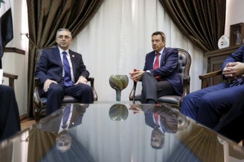 Syria's Minister of National Reconciliation Affairs Ali Haidar (L) sits with Peter Maurer, President of the International Committee of the Red Cross (ICRC), in Damascus, Syria February 23, 2016. PHOTO BY REUTERS/Omar Sanadiki