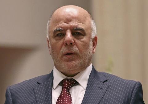 Iraq's new Prime Minister Haider al-Abadi speaks to Iraqi lawmakers before submitting his government in Baghdad