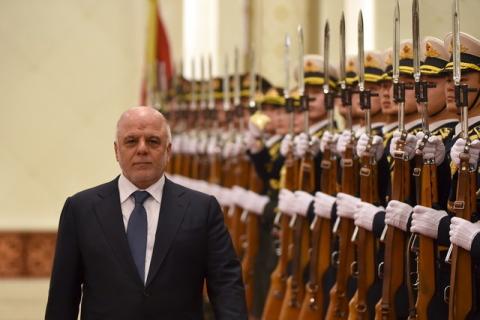 Iraqi Prime Minister Haider al-Abadi and Chinese Premier Li Keqiang (not in picture) inspect Chinese honour guards during a welcome ceremony at the Great Hall of the People in Beijing on December 22,2015. PHOTO BY REUTERS/Wang Zhao