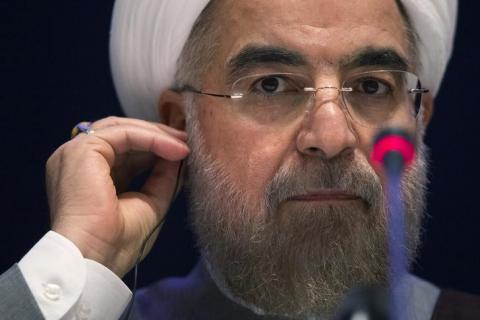 Iran's President Hassan Rouhani listens to a question during a news conference on the sidelines of the 69th United Nations General Assembly at United Nations Headquarters in New York, September 26, 2014. PHOTO BY REUTERS/Adrees Latif
