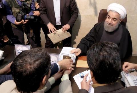 Iranian President Hassan Rouhani registers for February's election of the Assembly of Experts, the clerical body that chooses the supreme leader, at the Interior Ministry in Tehran, December 21, 2015. PHOTO BY REUTERS/Raheb Homavandi