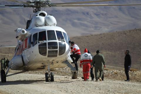 Members of emergency and rescue team search for the plane that crashed in a mountainous area of central Iran, February 19, 2018. PHOTO BY REUTERS/Tasnim News Agency