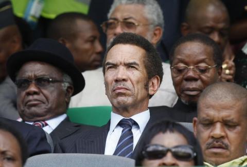 Botswana's President Ian Khama is flanked by Namibia's President Hifikepunye Pohamba ( L) and Malawi's former president, Bakili Muluzi (R, with glasses) during the ANC's centenary celebration in Bloemfontein, January 8, 2012. PHOTO BY REUTERS/Siphiwe Sibeko