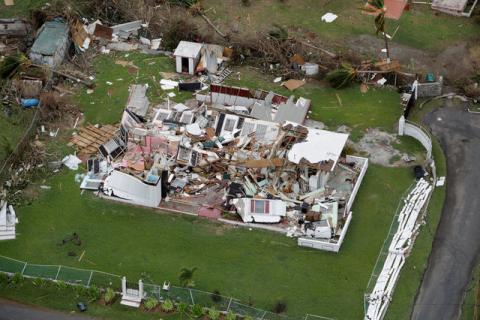 A destroyed home is seen from a Marine Corps MV-22 Osprey surveying damage from Hurricane Maria in St. Croix, , U.S. Virgin Islands, September 21, 2017. PHOTO BY REUTERS/Jonathan Drake