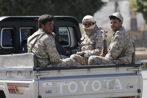 Houthi fighters ride a truck while patrolling a street near the Presidential Palace in Sanaa, January 21, 2015. PHOTO BY REUTERS/Khaled Abdullah
