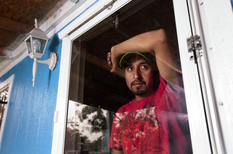 Crime victim Hugo Reyes, who applied for a United States U visa based on a violent attack by a man he did not know, is pictured at his home in Albuquerque, New Mexico, October 10, 2014. PHOTO BY REUTERS/Eric Draper