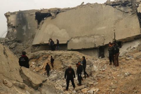 Civil defence members and people inspect a damaged mosque after an airstrike on the rebel-held village of al-Jina, Aleppo province in northwest Syria, March 17, 2017. PHOTO BY REUTERS/Ammar Abdullah