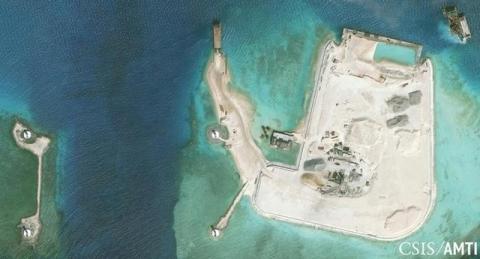 The artificial island at the southern end of Mischief Reef showing a newly-built seawall on its north side and a completed dock are shown in this Center for Strategic and International Studies (CSIS) Asia Maritime Transparency Initiative January 8, 2016 satellite image, January 15, 2016. PHOTO BY REUTERS/CSIS Asia Maritime Transparency Initiative