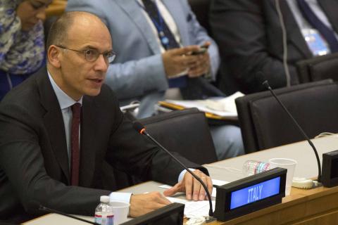 Italy's Prime Minister Enrico Letta speaks during a news conference following his address to the high-level meeting on Islamist groups in the Sahel region