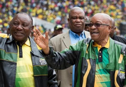 South African President Jacob Zuma (R) and Deputy President Cyril Ramaphosa wave to supporters at a rally to commemorate the 105th birthday of the ruling African National Congress (ANC), in Soweto, South Africa, January 8, 2017. PHOTO BY REUTERS/James Oatway