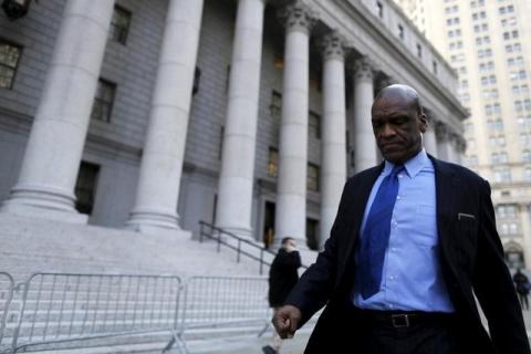 John Ashe, a former United Nations General Assembly president and U.N. ambassador from Antigua and Barbuda, exits the Manhattan U.S. District Courthouse in New York, December 10, 2015. PHOTO BY REUTERS/Brendan McDermid