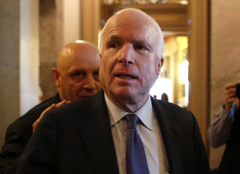 U.S. Senator John McCain (R-AZ) leaves after Senator Dianne Feinstein's (D-CA) speech on the Senate floor on Capitol Hill, in Washington, December 9, 2014. PHOTO BY REUTERS/Yuri Gripas