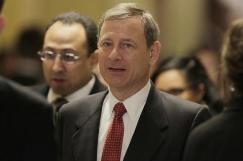 U.S. Supreme Court Chief Justice John Roberts departs after U.S. President Barack Obama's State of the Union address to a joint session of Congress in Washington, January 12, 2016. PHOTO BY REUTERS/Joshua Roberts