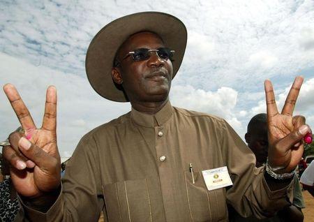 Former Minister of Information Jonathan Moyo makes a victory signs after casting his vote in a file photo. PHOTO BY REUTERS/Juda Ngwenya