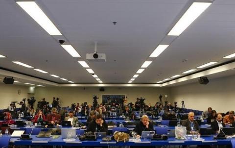 Journalists wait for the start of a news conference of Iranian Foreign Minister Mohammad Javad Zarif and the High Representative of the European Union for Foreign Affairs and Security Policy Federica Mogherini at the United Nations building in Vienna, Austria, January 16, 2016. PHOTO BY REUTERS/Leonhard Foeger