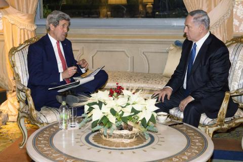 U.S. Secretary of State John Kerry (L) meets with Israeli Prime Minister Benjamin Netanyahu at Villa Taverna in Rome, December 15, 2014. PHOTO BY REUTERS/Evan Vucci
