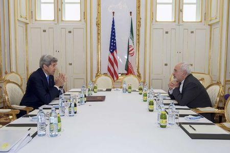 U.S. Secretary of State John Kerry (L) meets with Iranian Foreign Minister Javad Zarif at a hotel in Vienna, Austria, June 30, 2015. PHOTO BY REUTERS/State Department