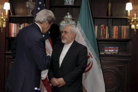U.S. Secretary of State John Kerry (L) meets with Iran's Foreign Minister Mohammad Javad Zarif in Manhattan, New York City, U.S., April 22, 2016. PHOTO BY REUTERS/Brendan McDermid