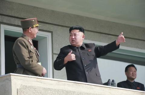 North Korean leader Kim Jong Un (C) attends a military drill between Korean People's Army (KPA) Large Combined Unit 526 and KPA Combined Unit 478 at an undisclosed location in this undated photo released by North Korea's Korean Central News Agency (KCNA) in Pyongyang, October 24, 2014. PHOTO BY REUTERS/KCNA