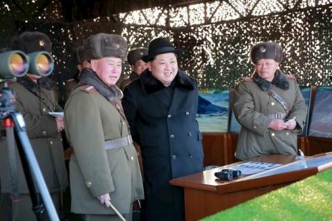 North Korean leader Kim Jong Un guides Korean People's Army (KPA) military drills, in this undated photo released by North Korea's Korean Central News Agency (KCNA) in Pyongyang, February 21, 2016. PHOTO BY REUTERS/KCNA