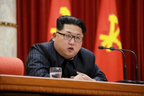 North Korean leader Kim Jong Un speaks during a ceremony to award party and state commendations to nuclear scientists, technicians, soldier-builders, workers and officials for their contribution to what North Korea said was a successful hydrogen bomb test, January 13, 2016. PHOTO BY REUTERS/KCNA