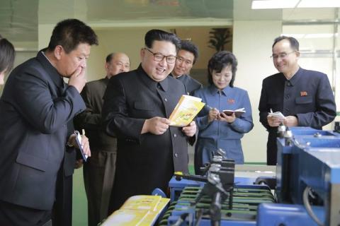 North Korean leader Kim Jong Un gives field guidance during his visit to the newly built Mindulle Notebook Factory in Pyongyang, April 19, 2016. PHOTO BY REUTERS/North Korea's Korean Central News Agency