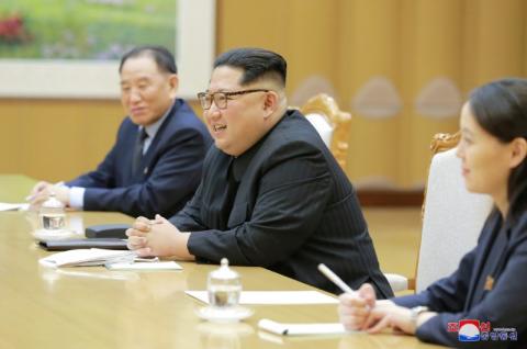 North Korean leader Kim Jong Un meets members of the special delegation of South Korea's President in this photo released by North Korea's Korean Central News Agency (KCNA) on March 6, 2018. PHOTO BY REUTERS/KCNA