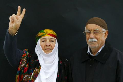 A Kurdish couple poses for a picture as they arrive for a gathering celebrating Newroz in Diyarbakir, March 21, 2015. PHOTO BY REUTERS/Umit Bektas