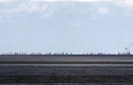 The alleged on-going land reclamation of China at Subi reef is seen from Pagasa island (Thitu Island) in the Spratlys group of islands in the South China Sea, west of Palawan, Philippines, in this May 11, 2015 file photo. PHOTO BY REUTERS/Ritchie B. Tongo