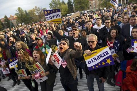 Latino leaders and immigration reform supporters gather at Farrand Field on the campus of the University of Colorado to launch "My Country, My Vote," a 12-month voter registration campaign to mobilize Colorado's Latino, immigrant and allied voters, October 28, 2015. PHOTO BY REUTERS/Evan Semon