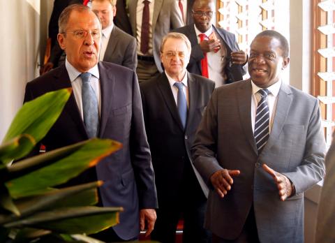 Zimbabwean President Emmerson Mnangagwa walks with Russian Foreign Minister Sergey Lavrov before their meeting in Harare, Zimbabwe, March 8, 2018. PHOTO BY REUTERS/Philimon Bulawayo