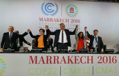 U.N. climate chief Patricia Espinosa (2nd L), Morocco's Foreign Minister Salaheddine Mezouar (C), and Council of Europe Goodwill Ambassador Bianca Jagger (2nd R) celebrate after the proclamation of Marrakech, at the UN World Climate Change Conference 2016 (COP22) in Marrakech, Morocco, November 17, 2016. PHOTO BY REUTERS/Stringer