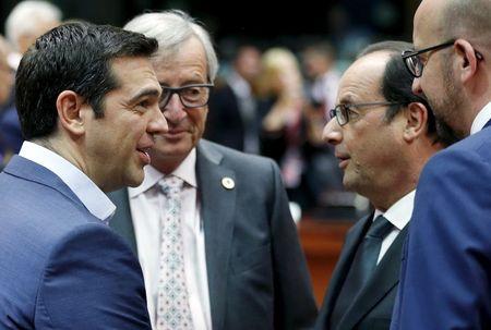 (L-R) Greece's Prime Minister Alexis Tsipras, European Commission President Jean-Claude Juncker, France's President Francois Hollande and Belgium's Prime Minister Charles Michel attend an euro zone leaders summit in Brussels, Belgium, July 12, 2015. PHOTO BY REUTERS/Francois Lenoir