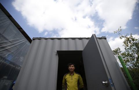 North Korean defector Lee Min-bok poses for photographs during an interview with Reuters at his home in Pocheon, about 15 km (9 miles) south of the demilitarized zone separating the two Koreas