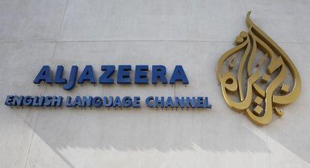 The logo of Qatar-based Al Jazeera satellite news channel is seen in Doha, February 7, 2011. PHOTO BY REUTERS/ Fadi Al-Assaad
