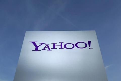A Yahoo logo is pictured in front of a building in Rolle, 30 km (19 miles) east of Geneva, Switzerland on December 12, 2012. PHOTO BY REUTERS/Denis Balibouse