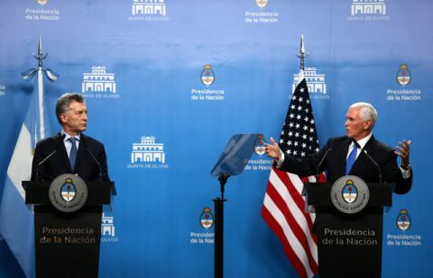 U.S. Vice President Mike Pence speaks next to Argentina's President Mauricio Macri during a news conference at the Olivos Presidential Residence in Buenos Aires, Argentina, August 15, 2017. PHOTO BY REUTERS/Marcos Brindicci